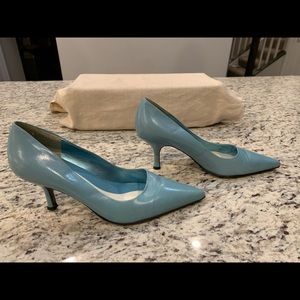 Nine West Light Blue pointed toward pumps